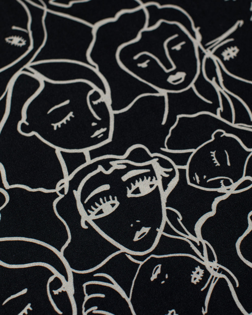 Crowded Faces Black Rayon Challis