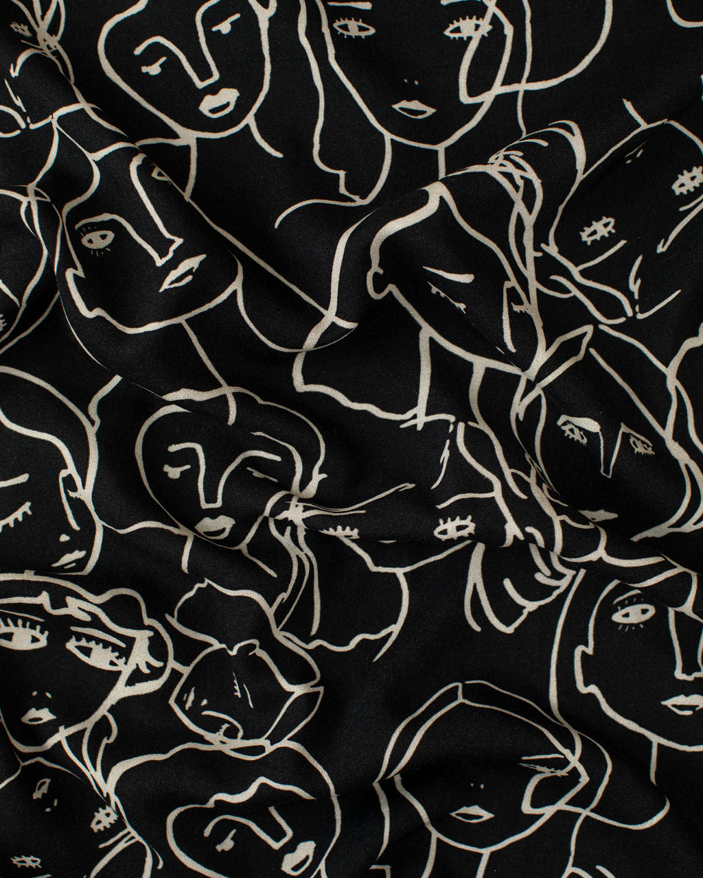 Crowded Faces Black Rayon Challis
